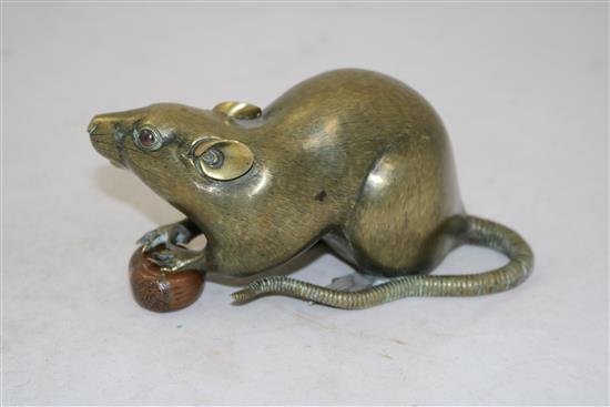 A Japanese gilt patinated bronze model of a rat with a nut, late 19th century, length 18cm